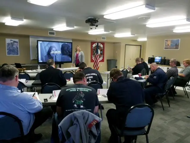Firefighters attending a classroom training session.